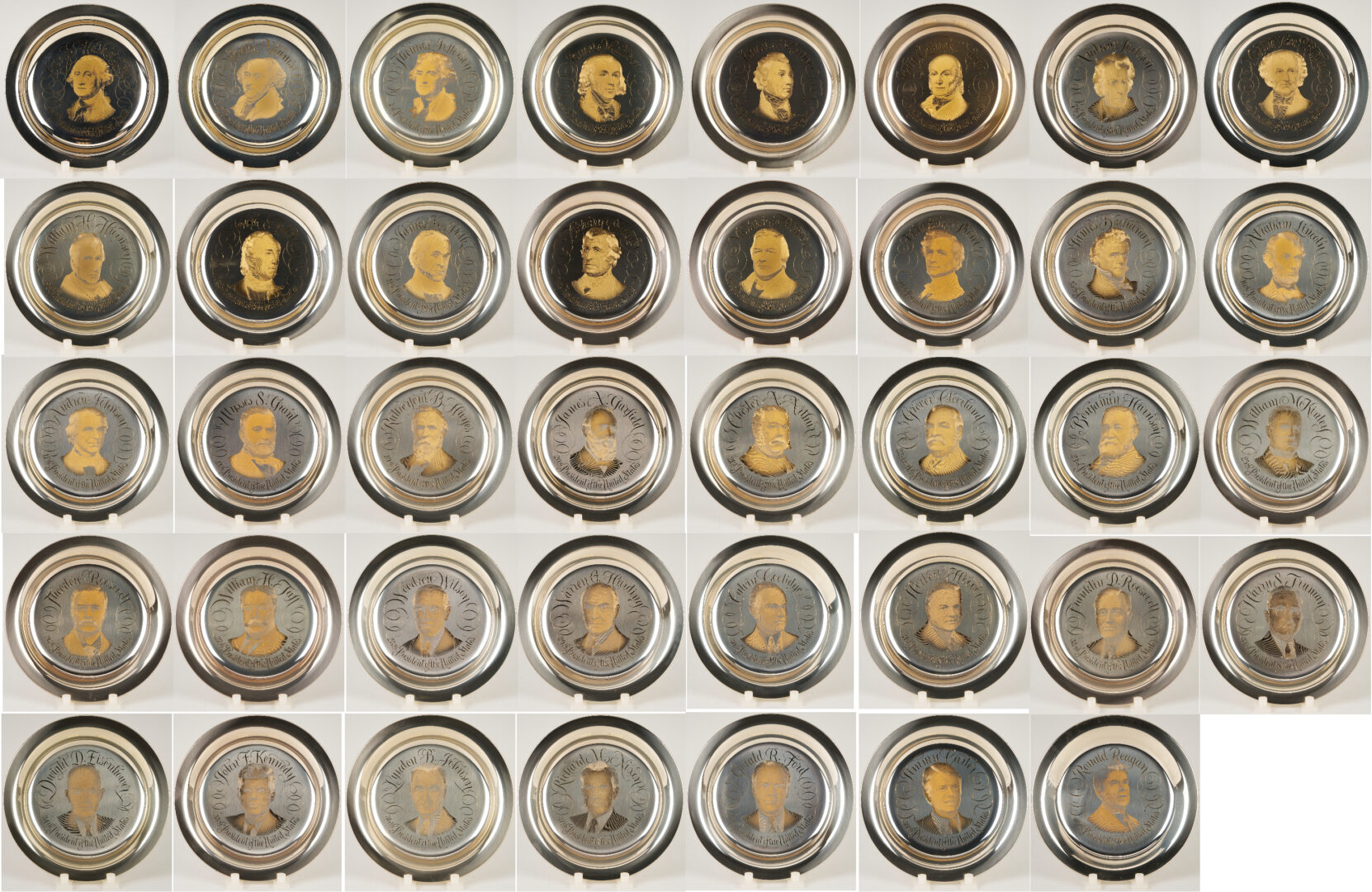 Lot 521: 39 Franklin Mint Presidential Sterling Silver Plates, 256 oz.