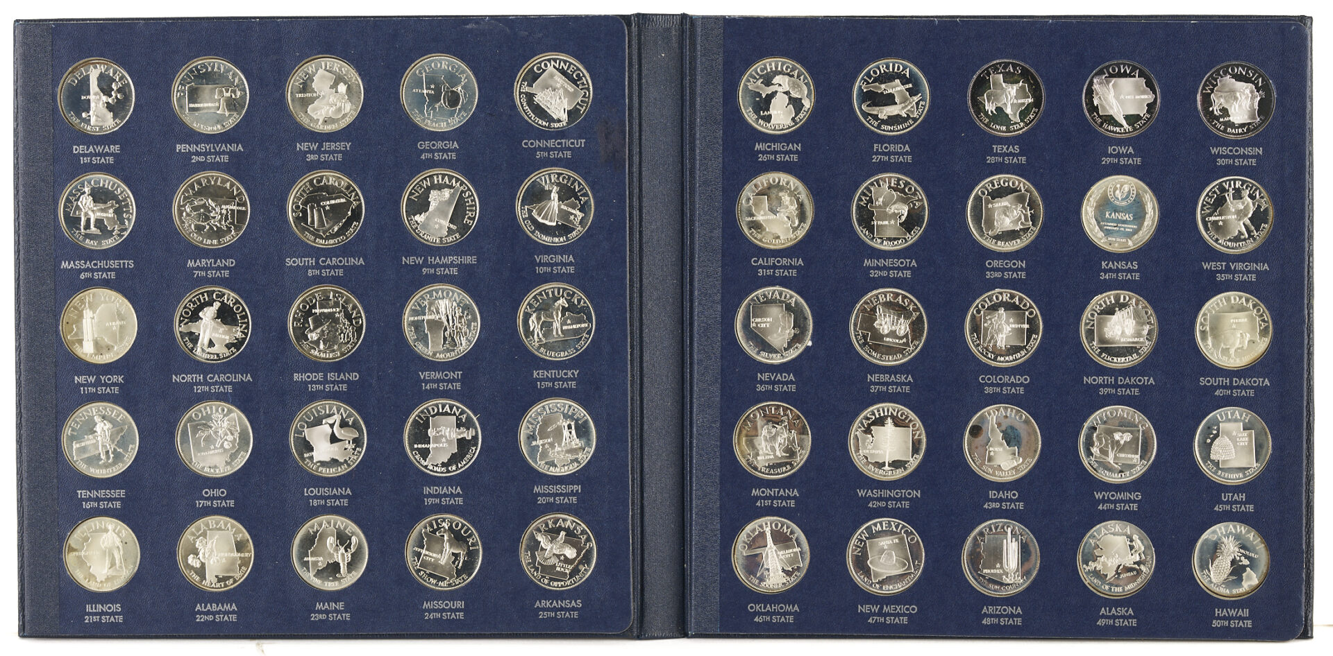 Lot 530: Franklin Mint Sterling Silver States of the Union Medallions, 23 oz.