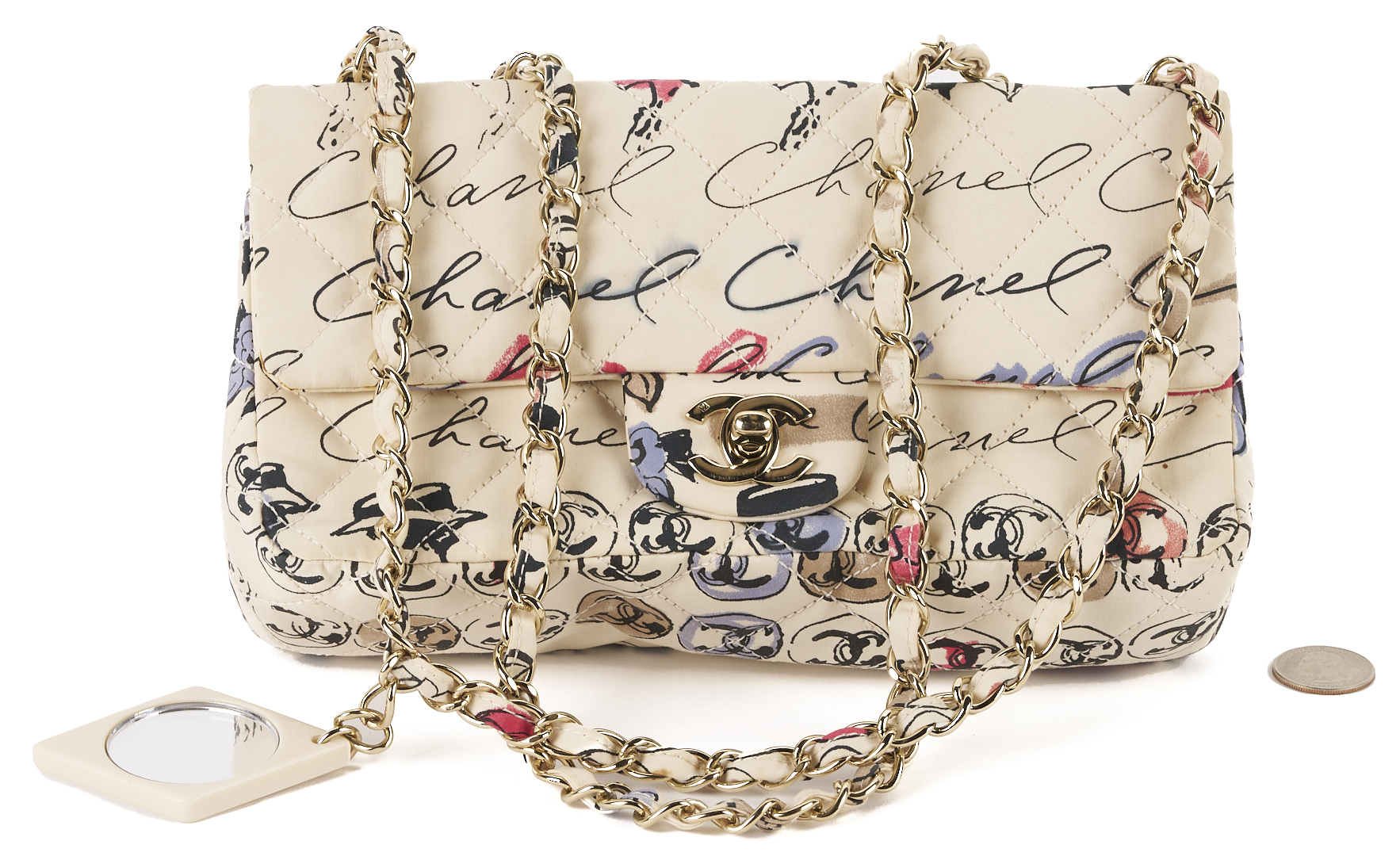 Lot 565: Chanel Nylon Quilted Rue Cambon Camellia Bag