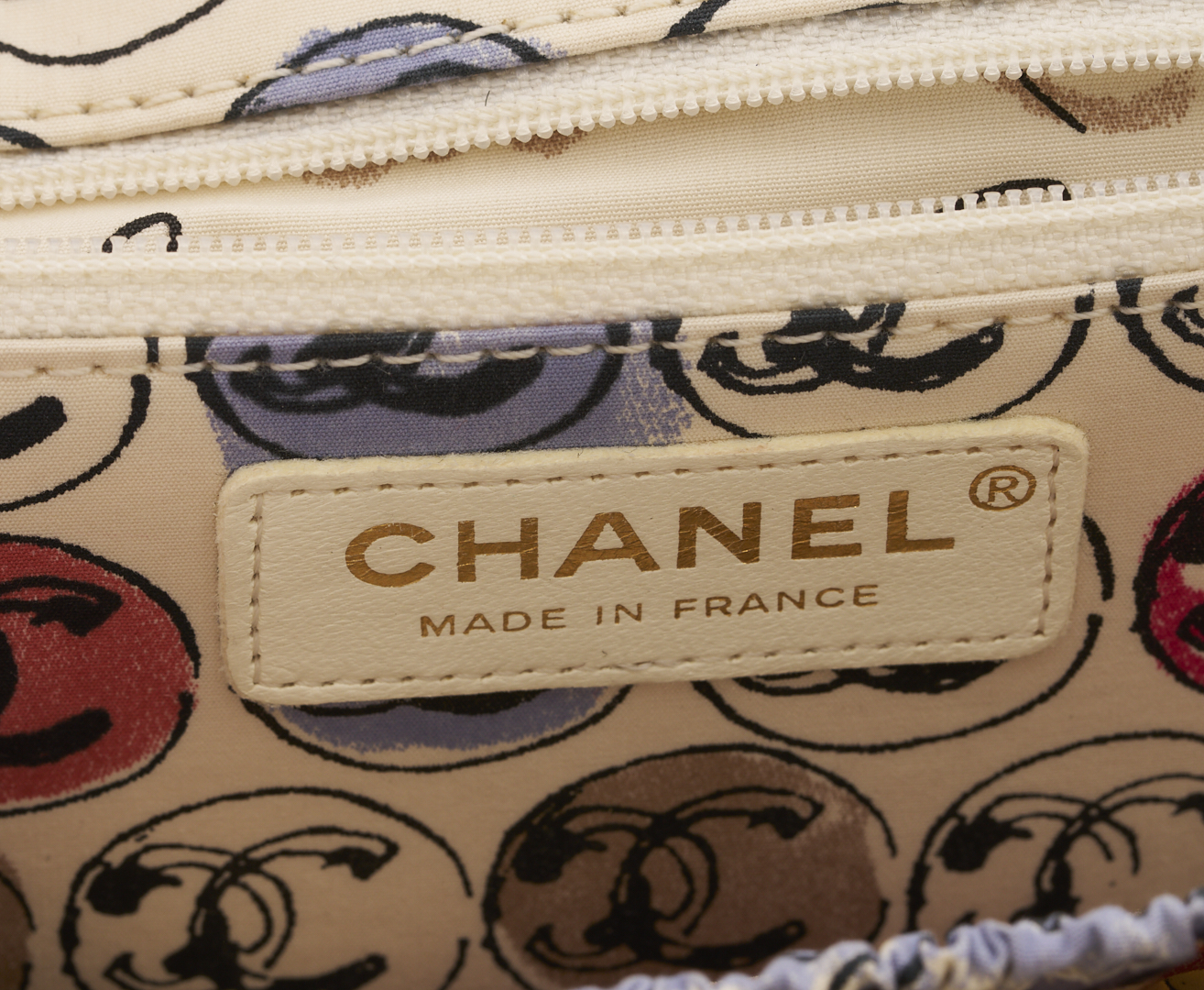 Lot 565: Chanel Nylon Quilted Rue Cambon Camellia Bag