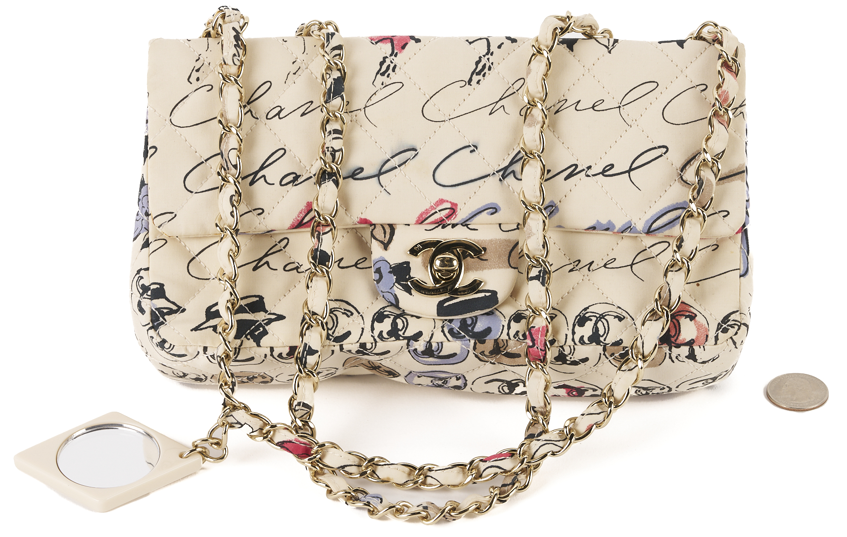 Lot 565: Chanel Nylon Quilted Rue Cambon Camellia Bag