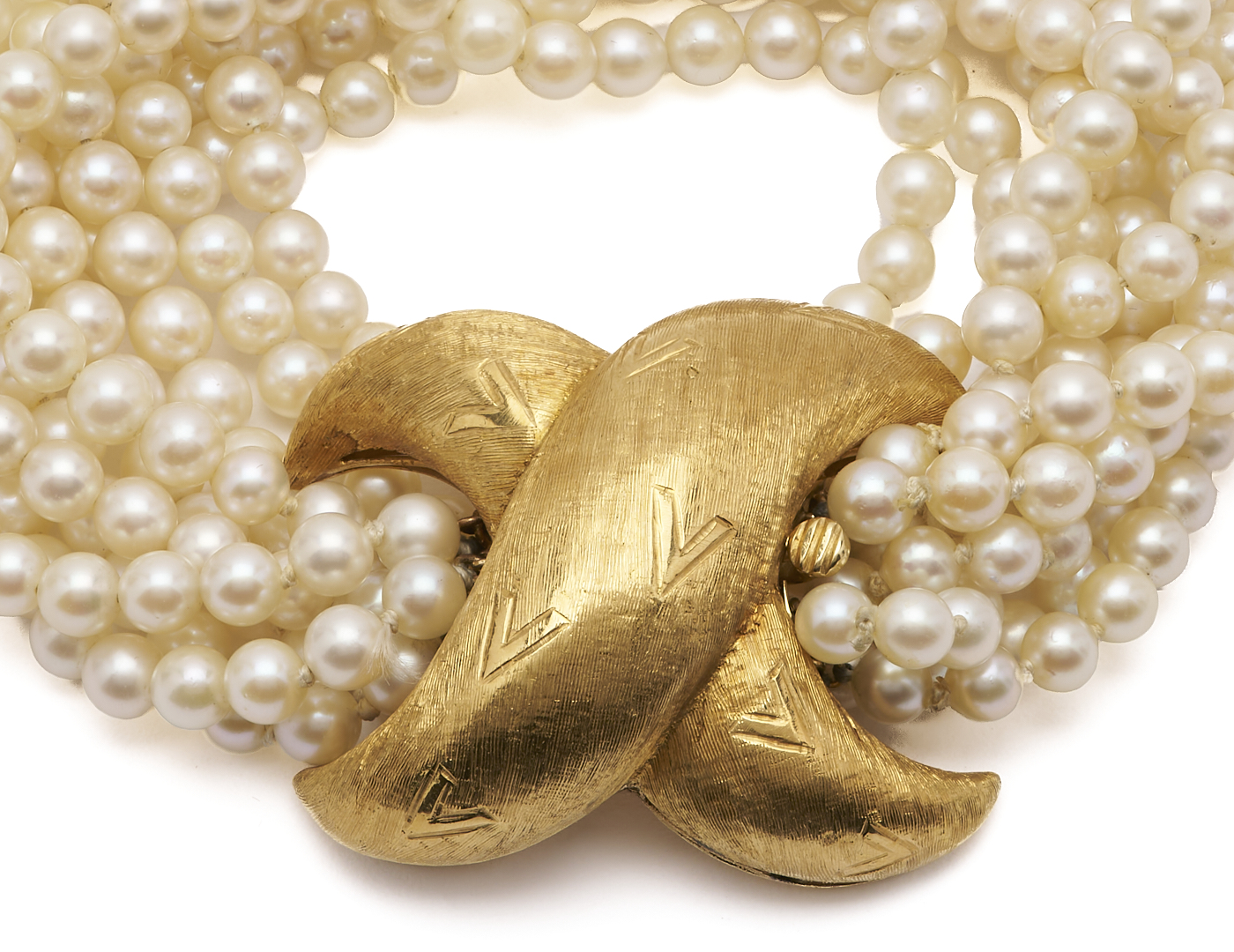 Lot 577: 18K Gold Designer Multi-Strand Pearl Bracelet