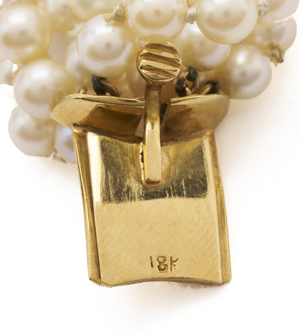 Lot 577: 18K Gold Designer Multi-Strand Pearl Bracelet