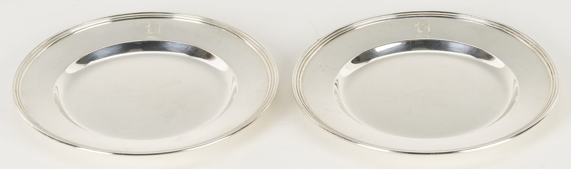Lot 616: 12 International Sterling Silver Bread Plates