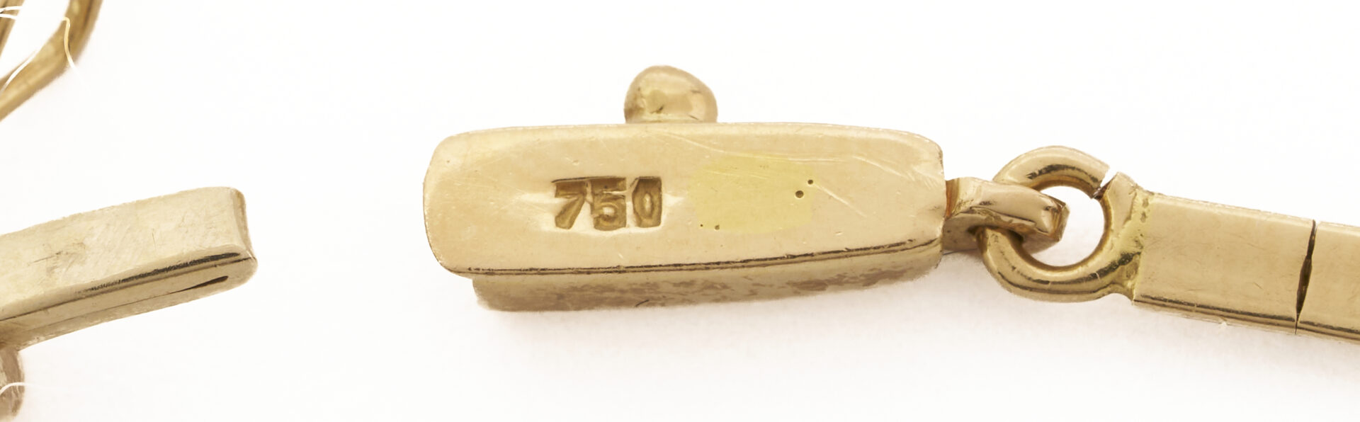 Lot 62: 18K Gold Bow Necklace