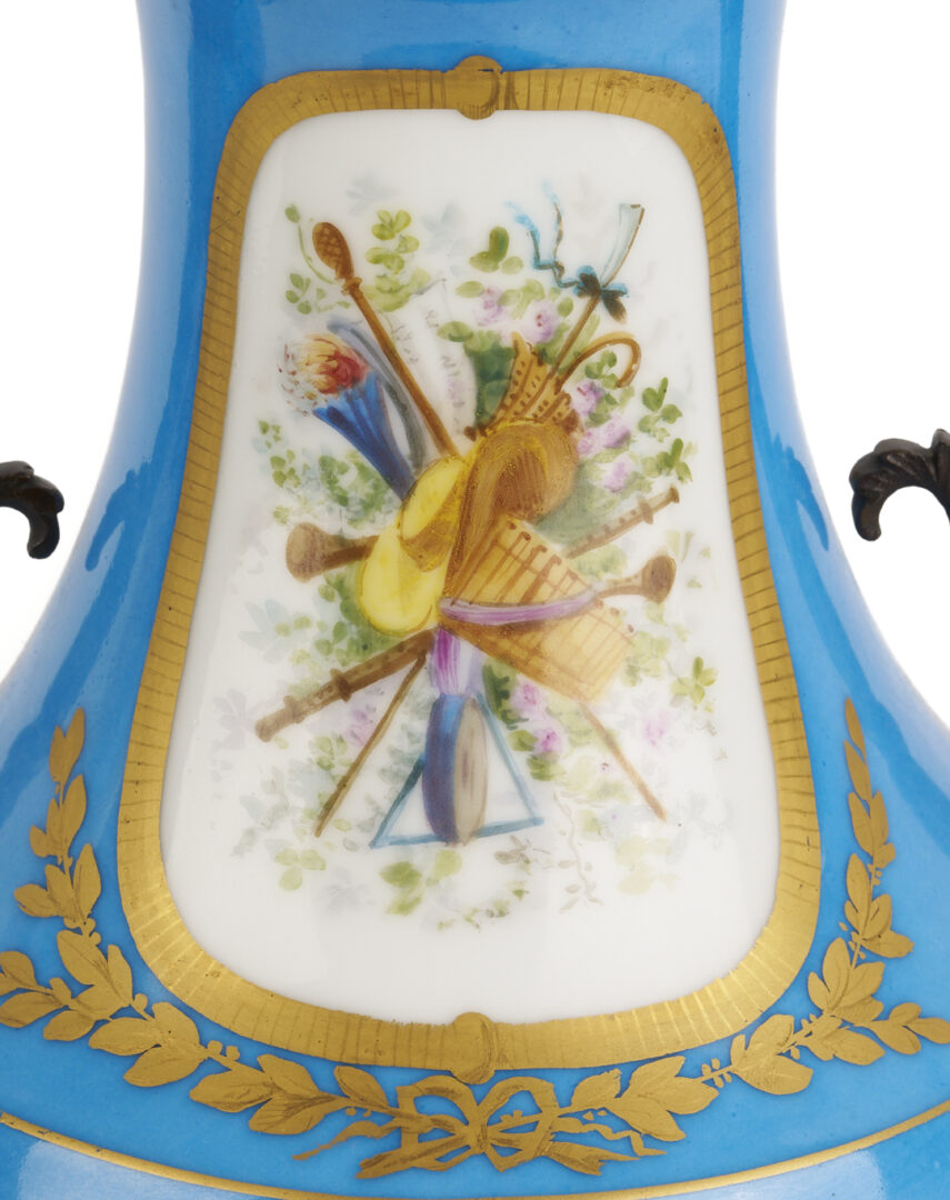 Lot 662: Pair of French Sevres Style Porcelain Urns