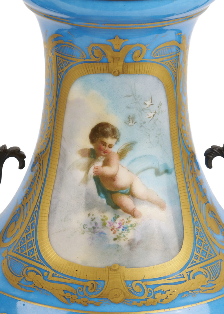 Lot 662: Pair of French Sevres Style Porcelain Urns