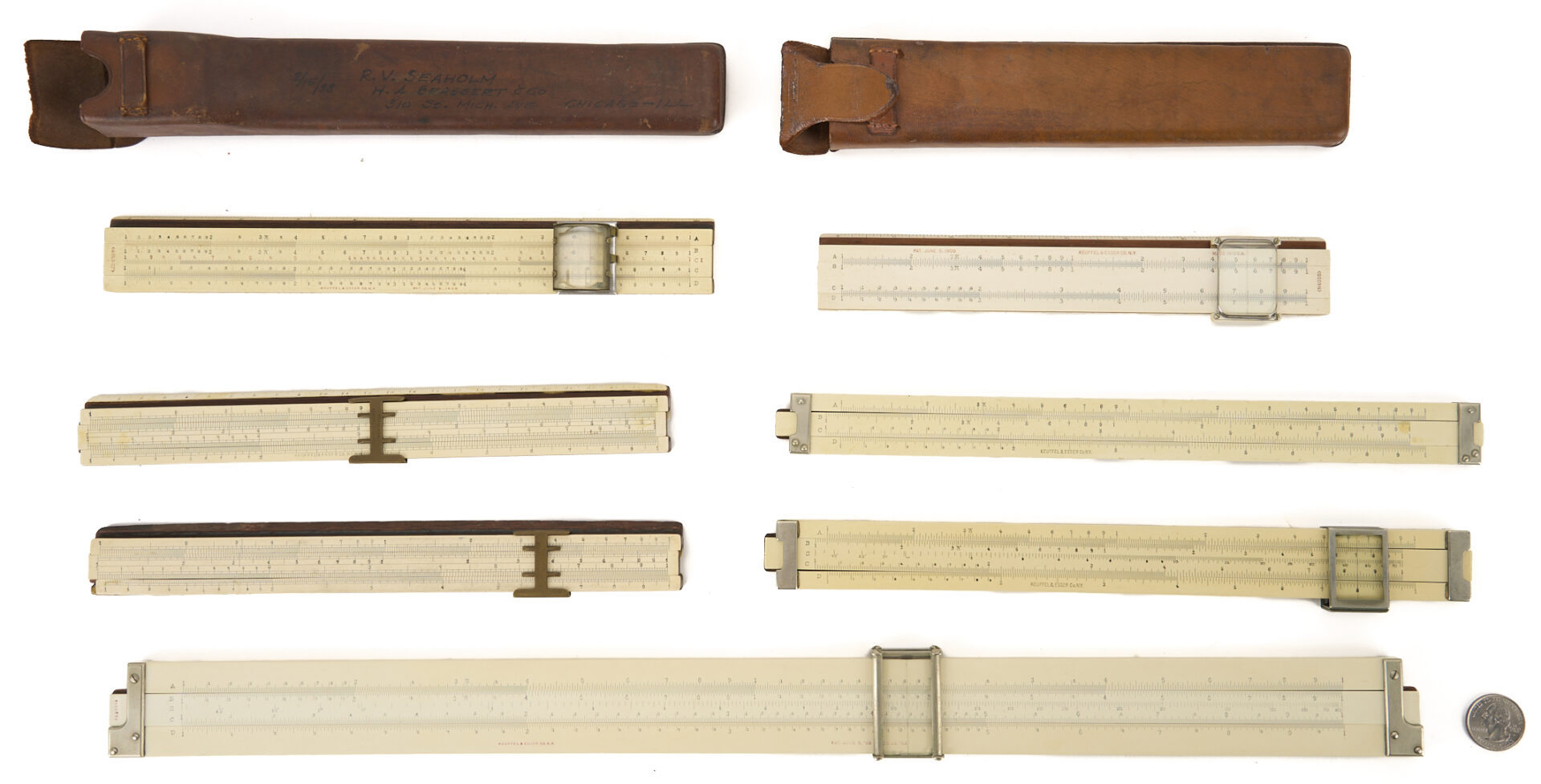 Lot 676: Grouping of 7 Keuffel & Esser Slide Rules; K&E