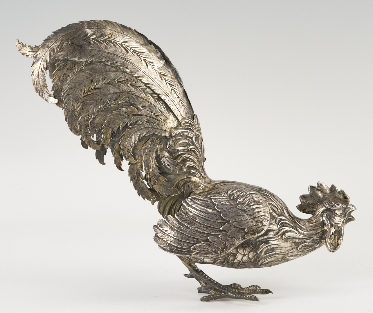 Lot 71: Pair of .800 Silver Fighting Cockerel Figures