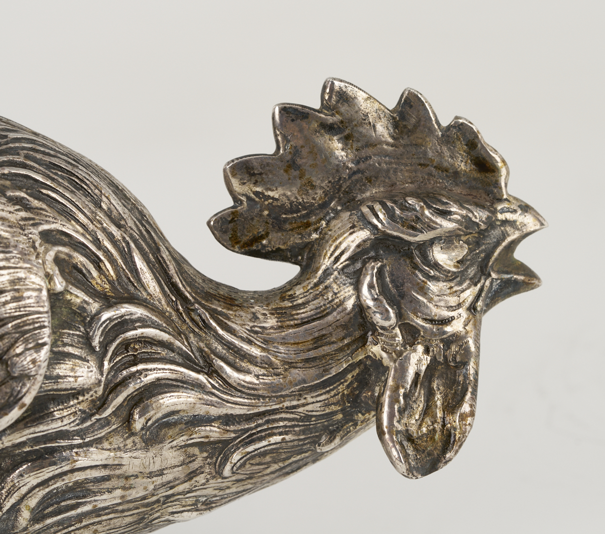 Lot 71: Pair of .800 Silver Fighting Cockerel Figures