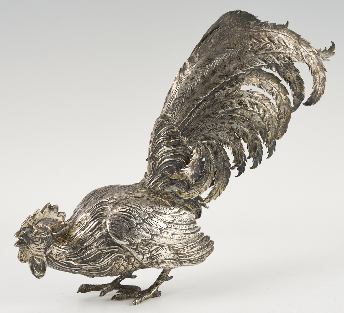 Lot 71: Pair of .800 Silver Fighting Cockerel Figures