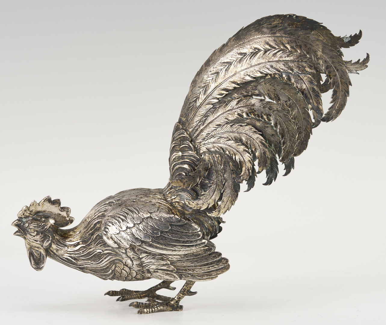 Lot 71: Pair of .800 Silver Fighting Cockerel Figures