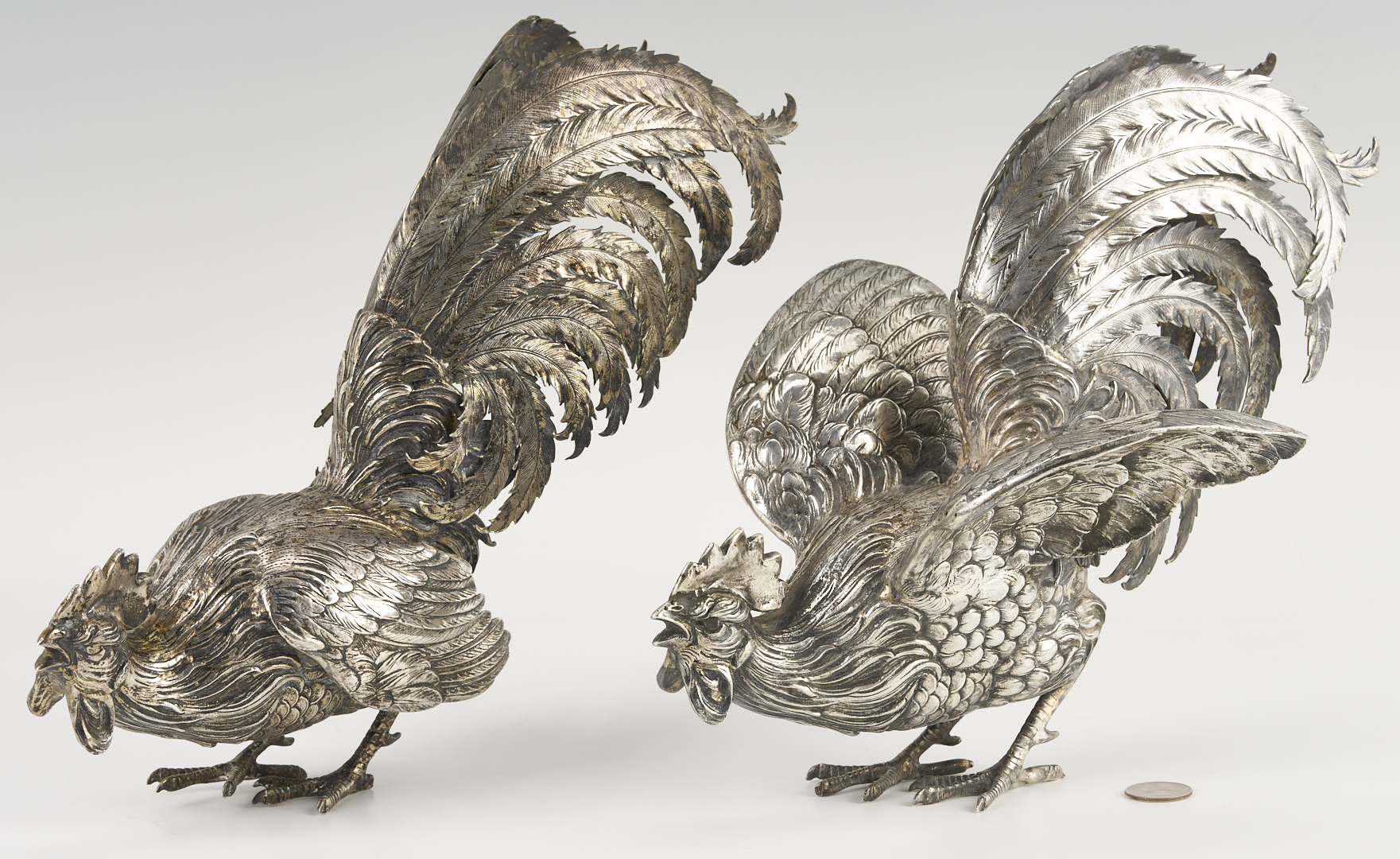 Lot 71: Pair of .800 Silver Fighting Cockerel Figures