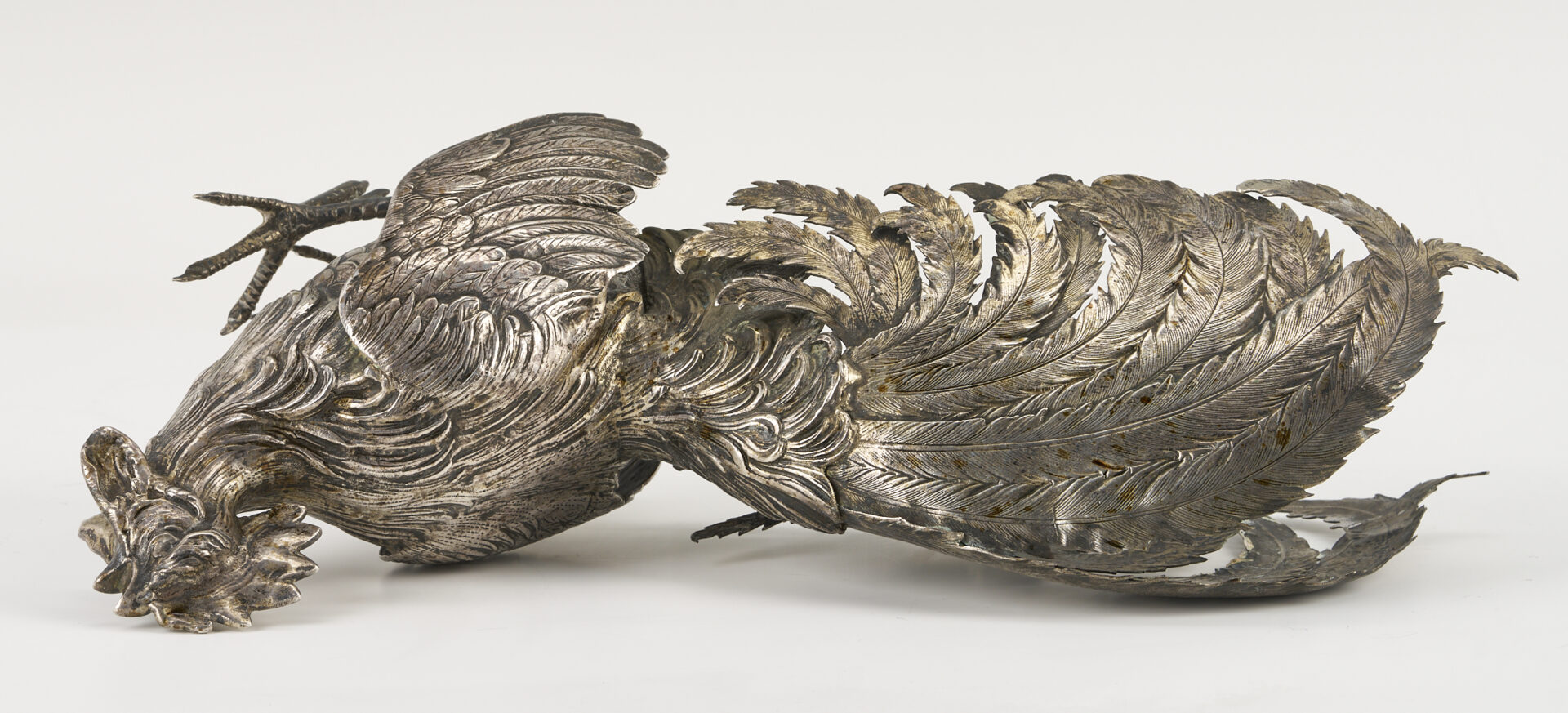 Lot 71: Pair of .800 Silver Fighting Cockerel Figures