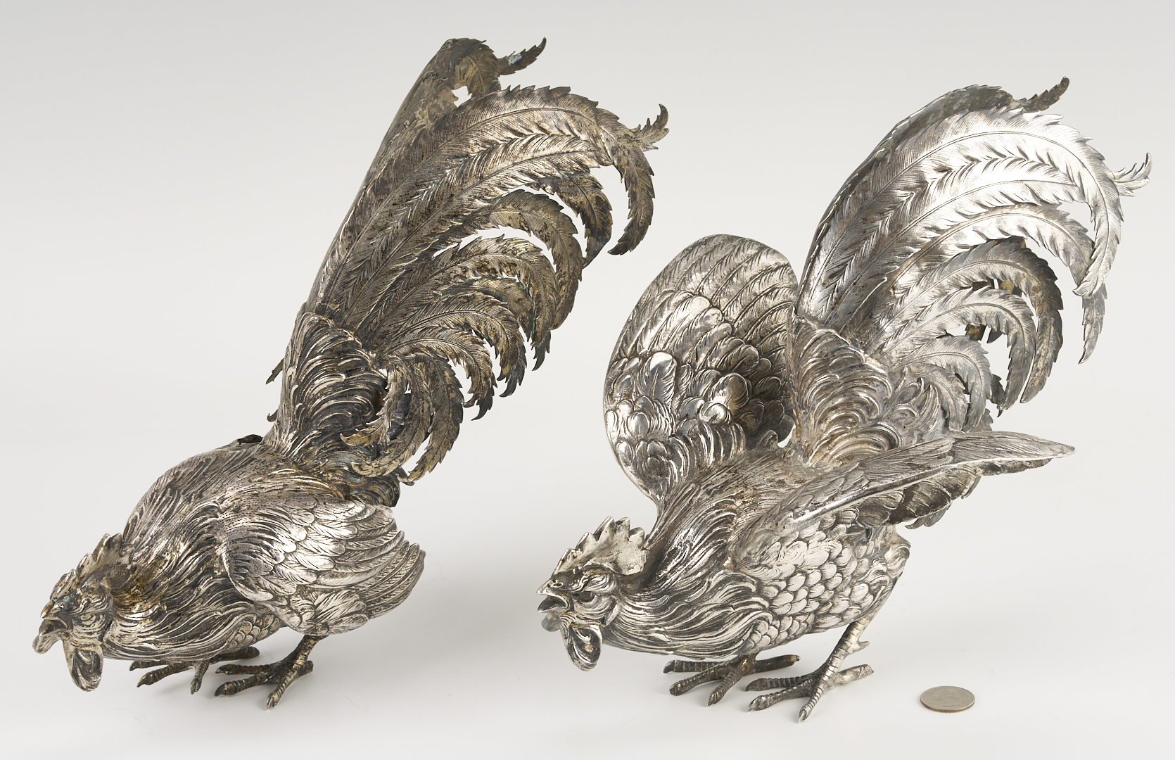 Lot 71: Pair of .800 Silver Fighting Cockerel Figures
