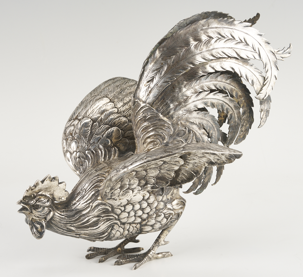 Lot 71: Pair of .800 Silver Fighting Cockerel Figures