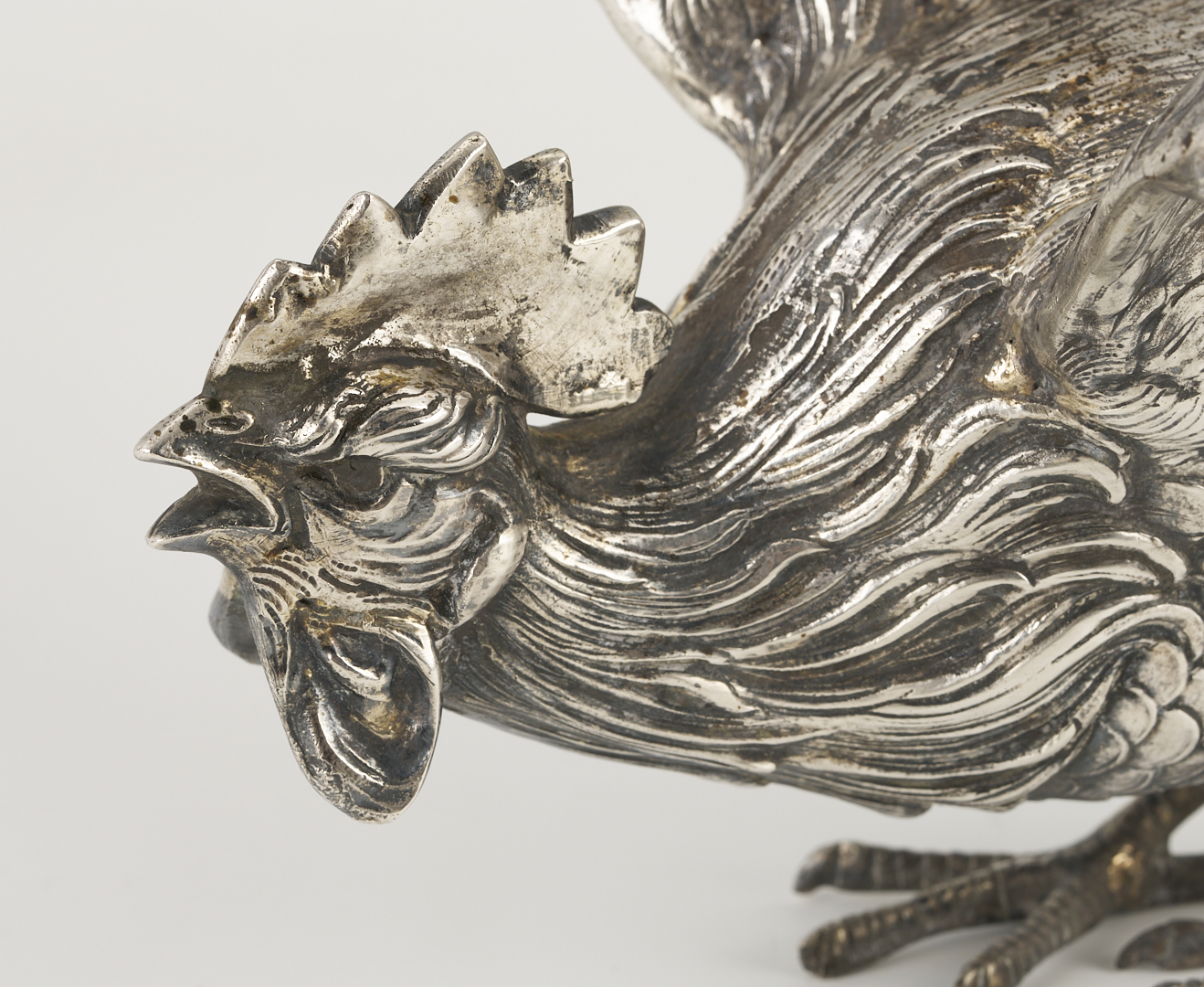 Lot 71: Pair of .800 Silver Fighting Cockerel Figures