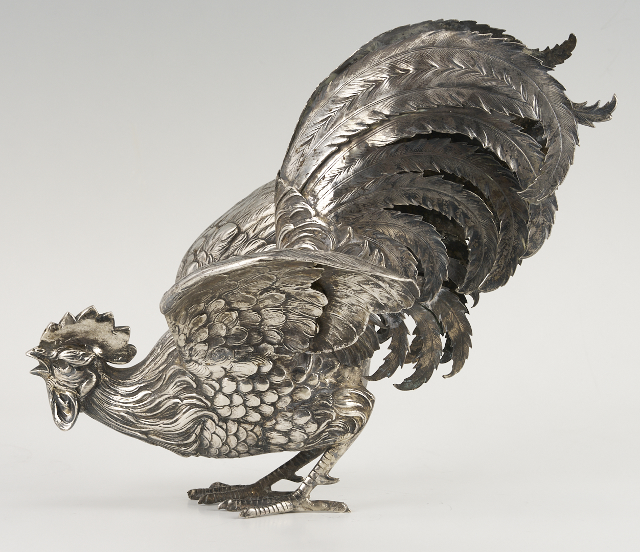 Lot 71: Pair of .800 Silver Fighting Cockerel Figures