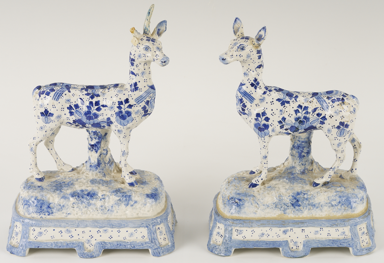 Lot 783: Pair of Delft Deer Figures