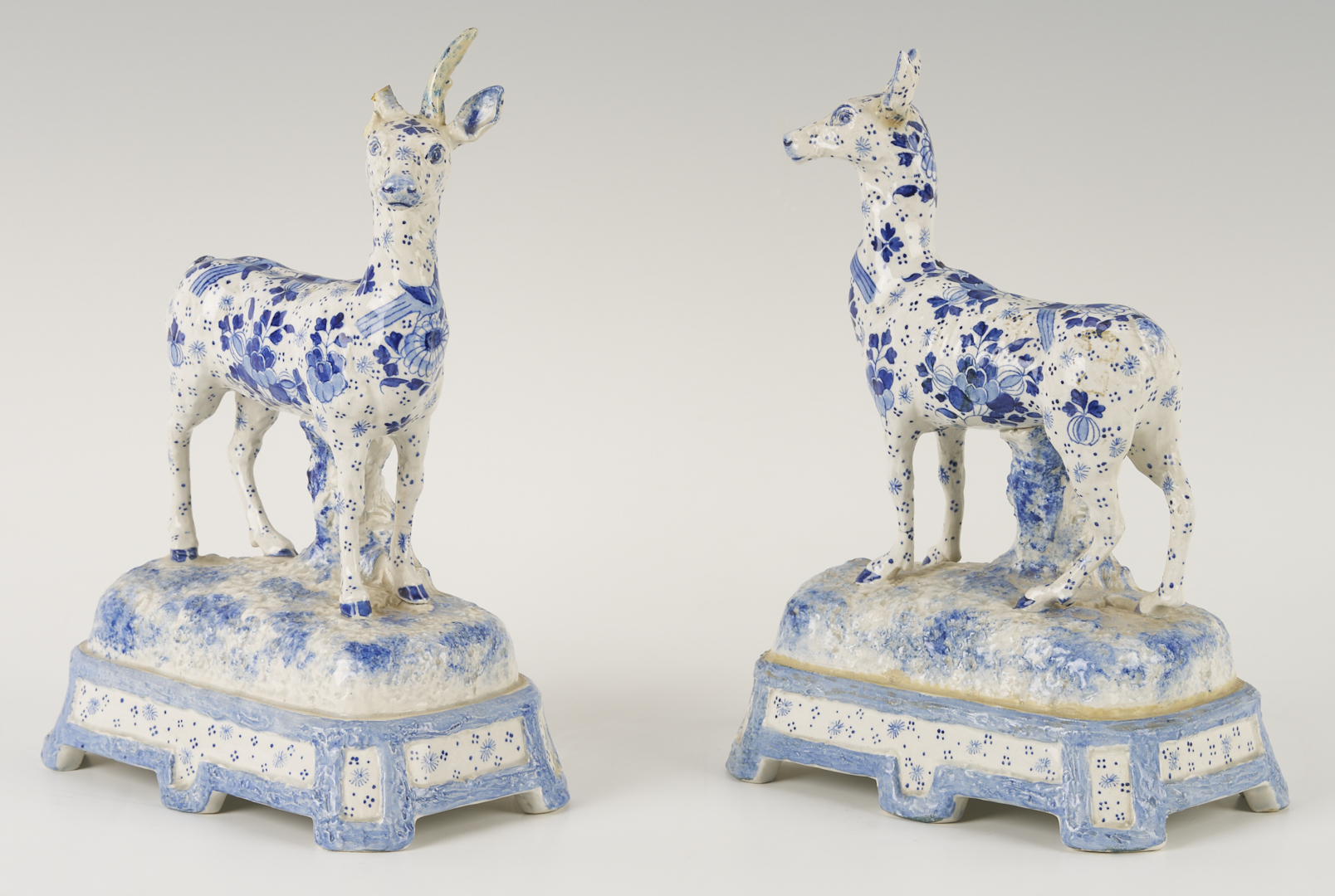 Lot 783: Pair of Delft Deer Figures