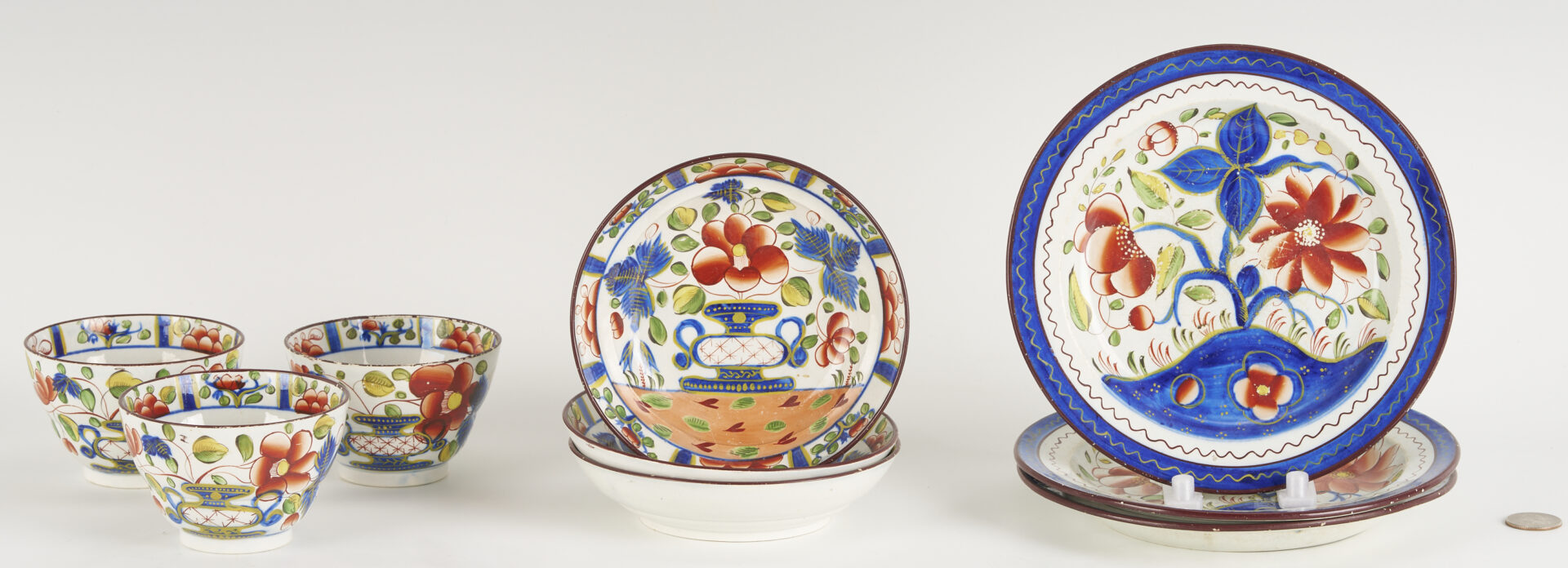 Lot 788: 9 pieces Gaudy Dutch: Plates, Cups, Saucers