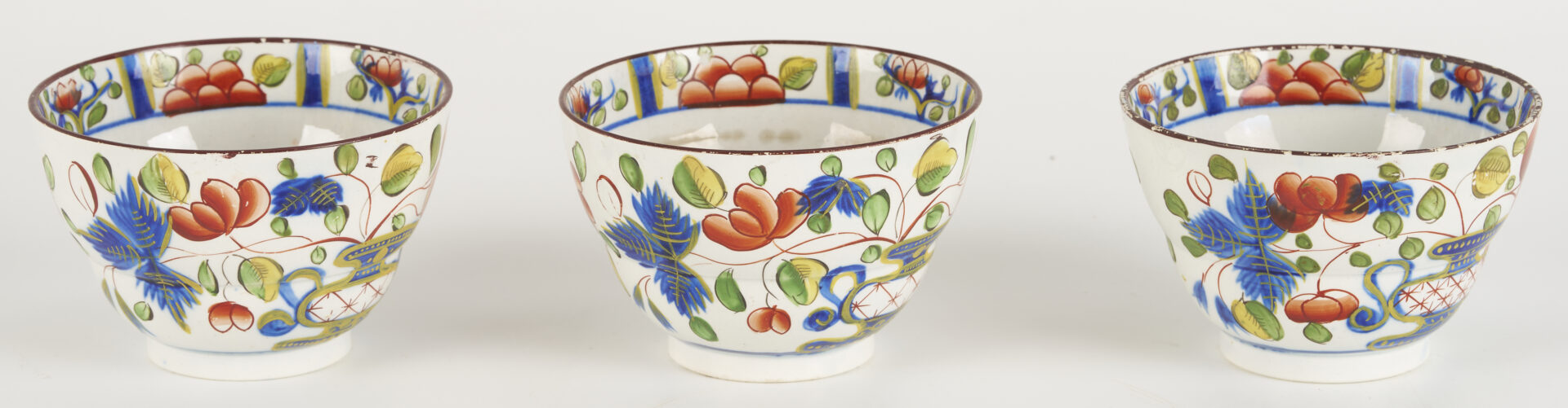 Lot 788: 9 pieces Gaudy Dutch: Plates, Cups, Saucers