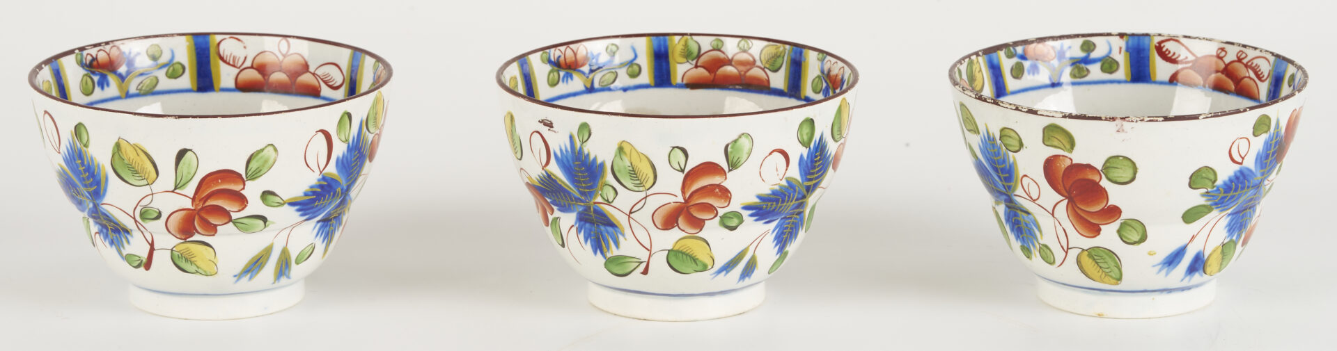 Lot 788: 9 pieces Gaudy Dutch: Plates, Cups, Saucers