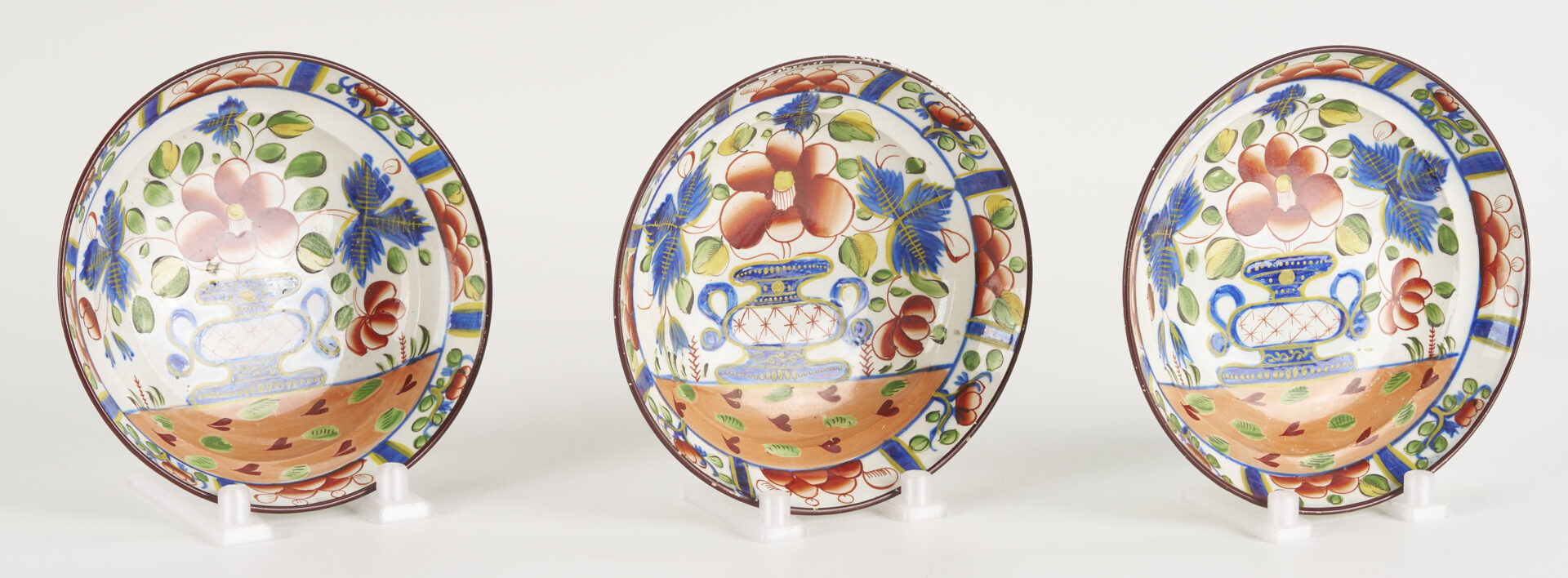 Lot 788: 9 pieces Gaudy Dutch: Plates, Cups, Saucers