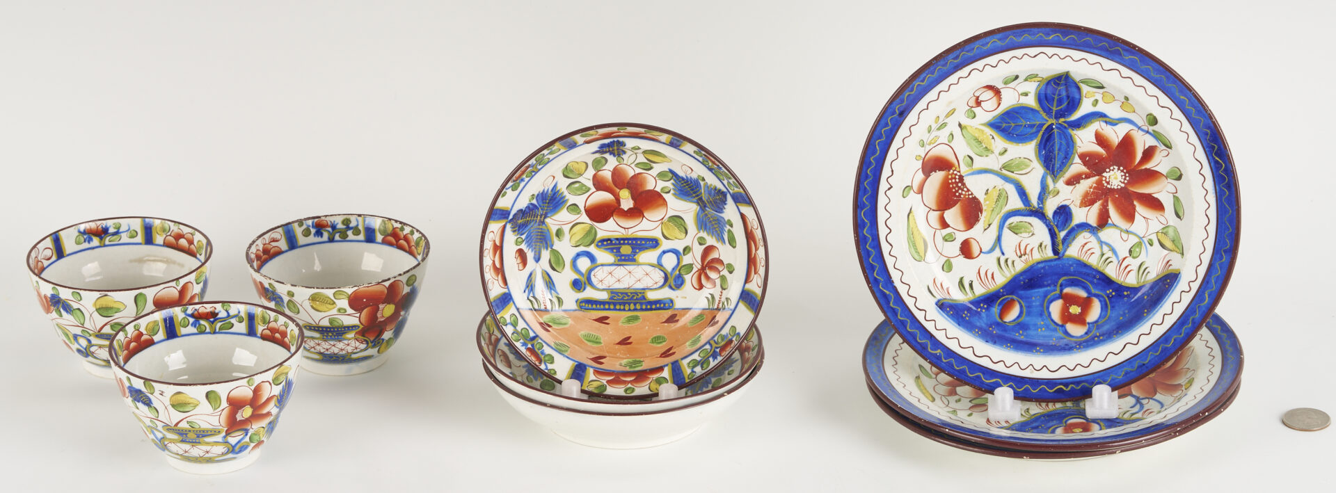 Lot 788: 9 pieces Gaudy Dutch: Plates, Cups, Saucers