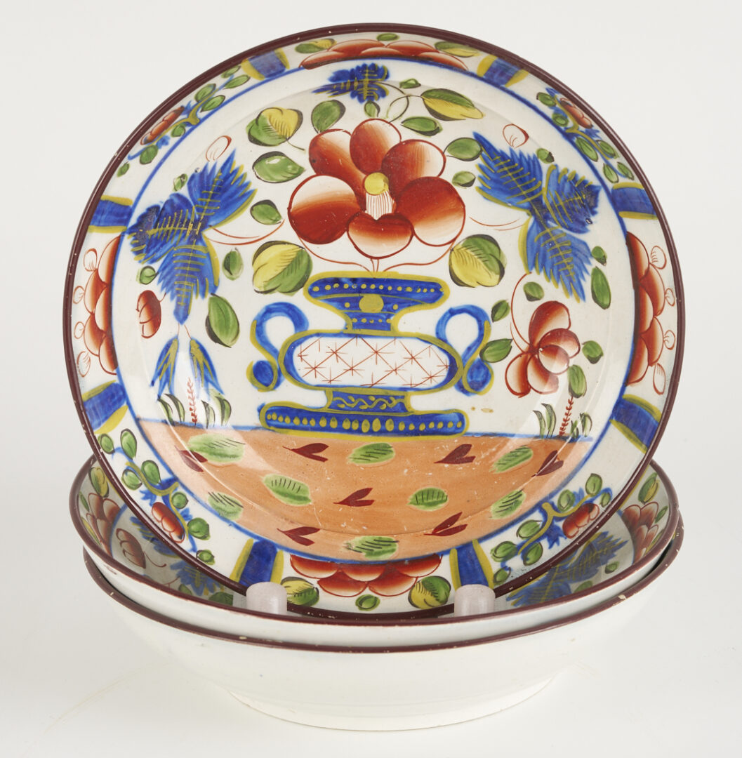 Lot 788: 9 pieces Gaudy Dutch: Plates, Cups, Saucers