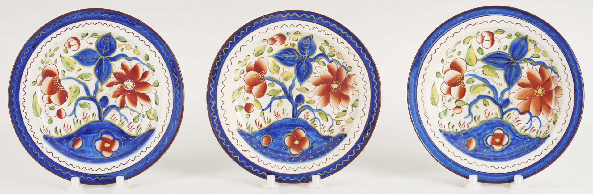 Lot 788: 9 pieces Gaudy Dutch: Plates, Cups, Saucers