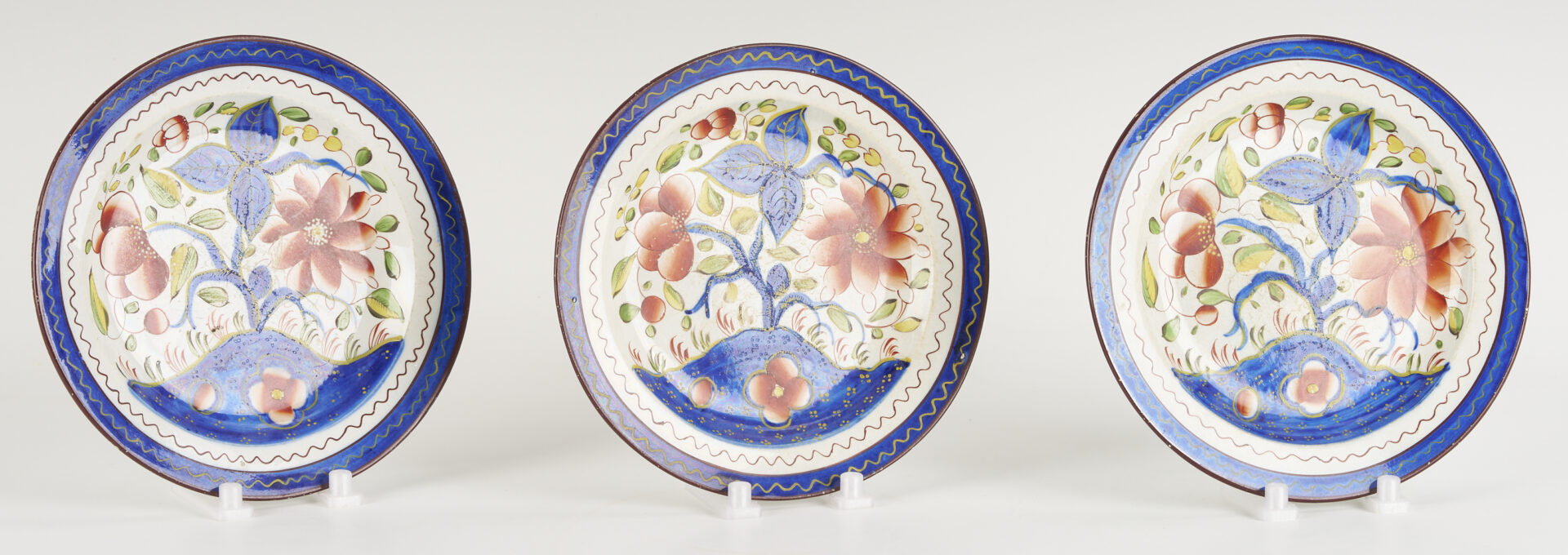 Lot 788: 9 pieces Gaudy Dutch: Plates, Cups, Saucers