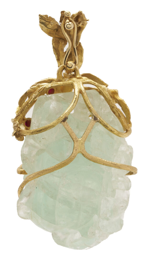 Lot 797: 2 Gold & Gemstone Pendants – 1 Floral & 1 Heart