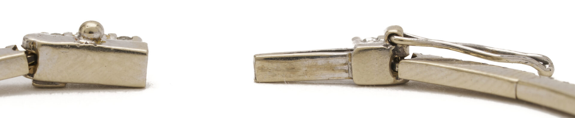 Lot 808: 18K Gold & Diamond Line Bracelet