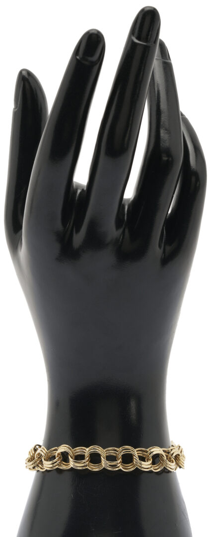 Lot 816: 14K Gold Double Link Charm Bracelet