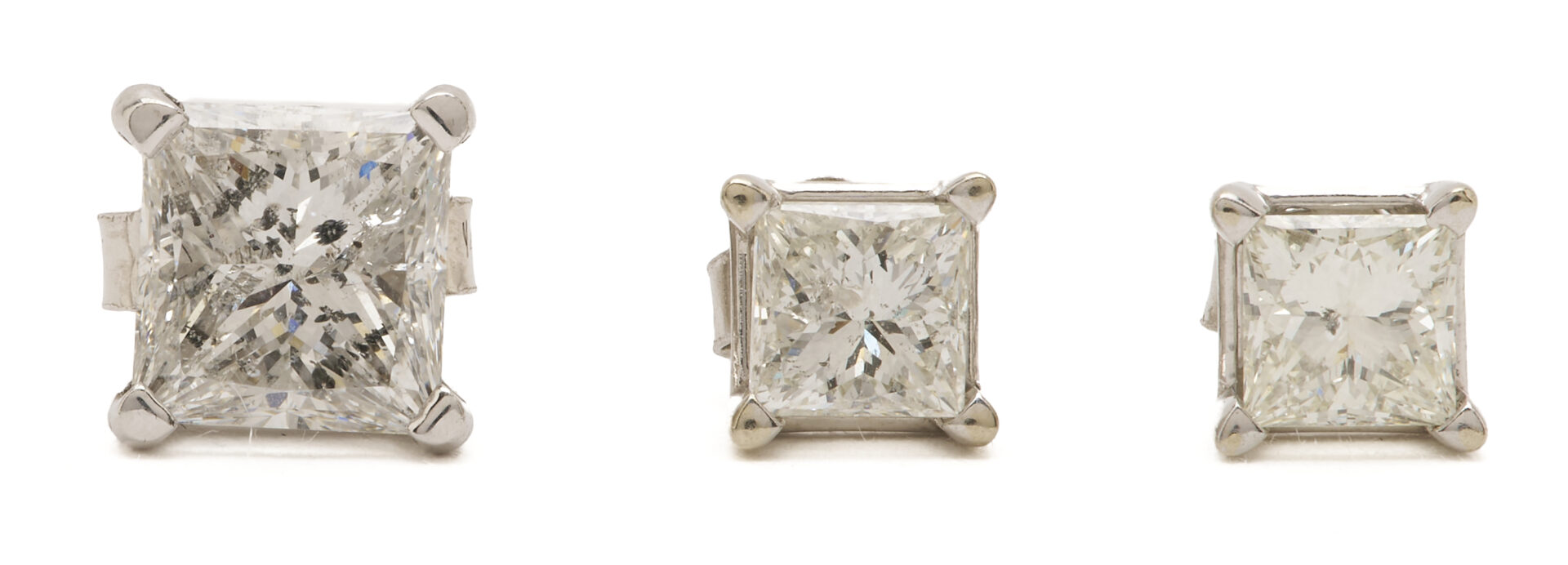 Lot 823: Three 14K Gold & Diamond Stud Earrings