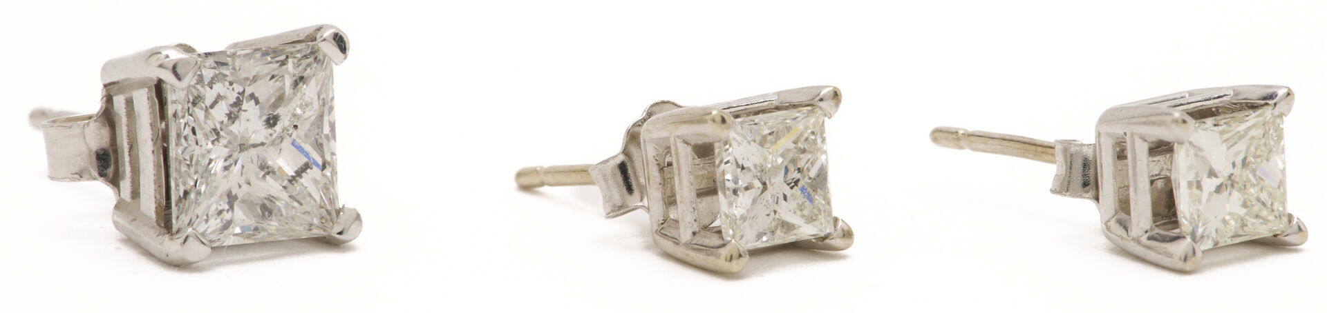 Lot 823: Three 14K Gold & Diamond Stud Earrings