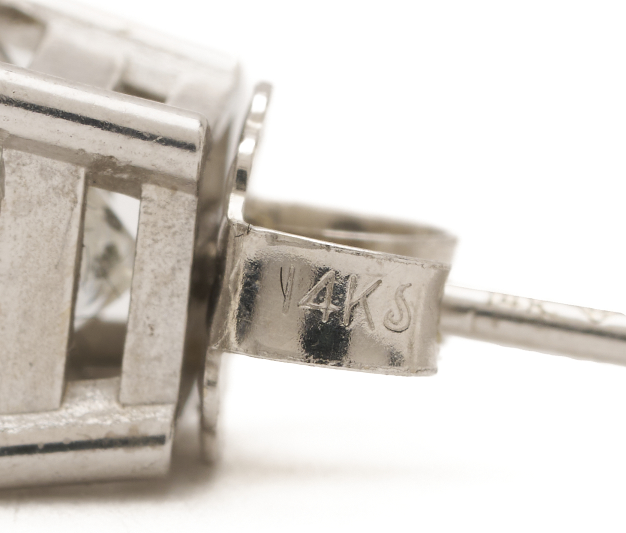 Lot 823: Three 14K Gold & Diamond Stud Earrings