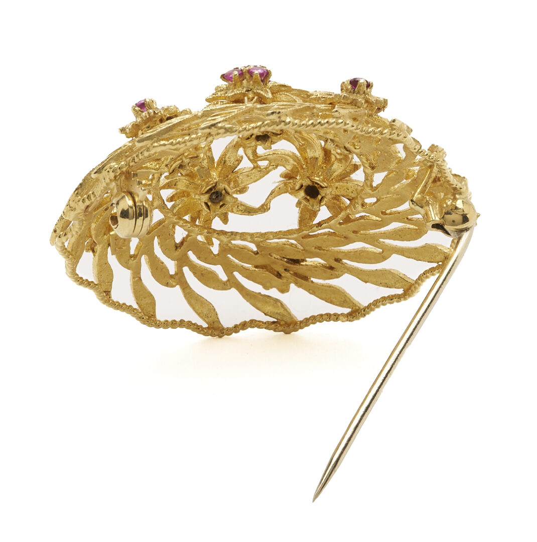 Lot 831: 18K Gold Floral Ruby Brooch