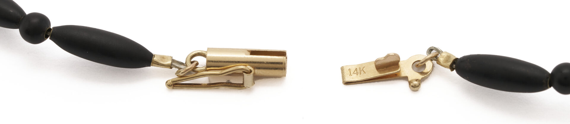 Lot 833: 4 Antique Jewelry Pieces: Longines Pocket Watch on Jet Chain, 2 Cameos, Onyx Bar Pin