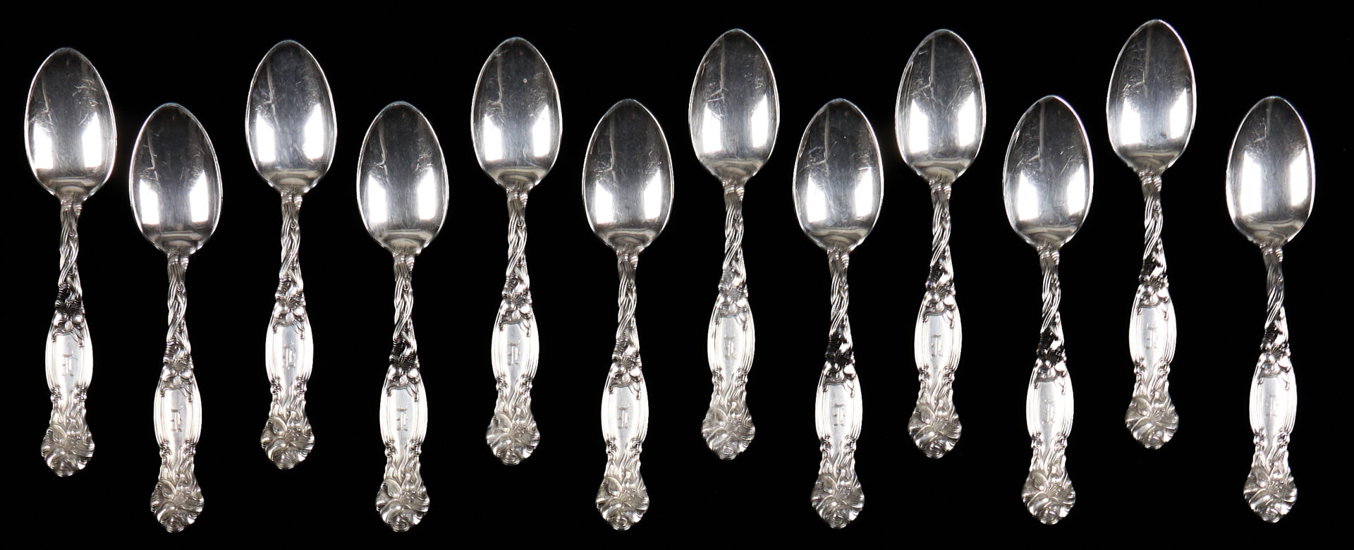 Lot 856: Tiffany Ice Tongs plus 24 Antique Silver Spoons
