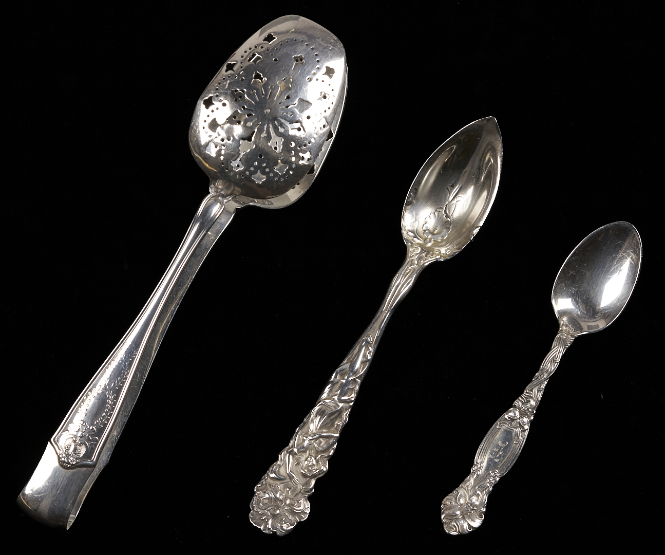 Lot 856: Tiffany Ice Tongs plus 24 Antique Silver Spoons