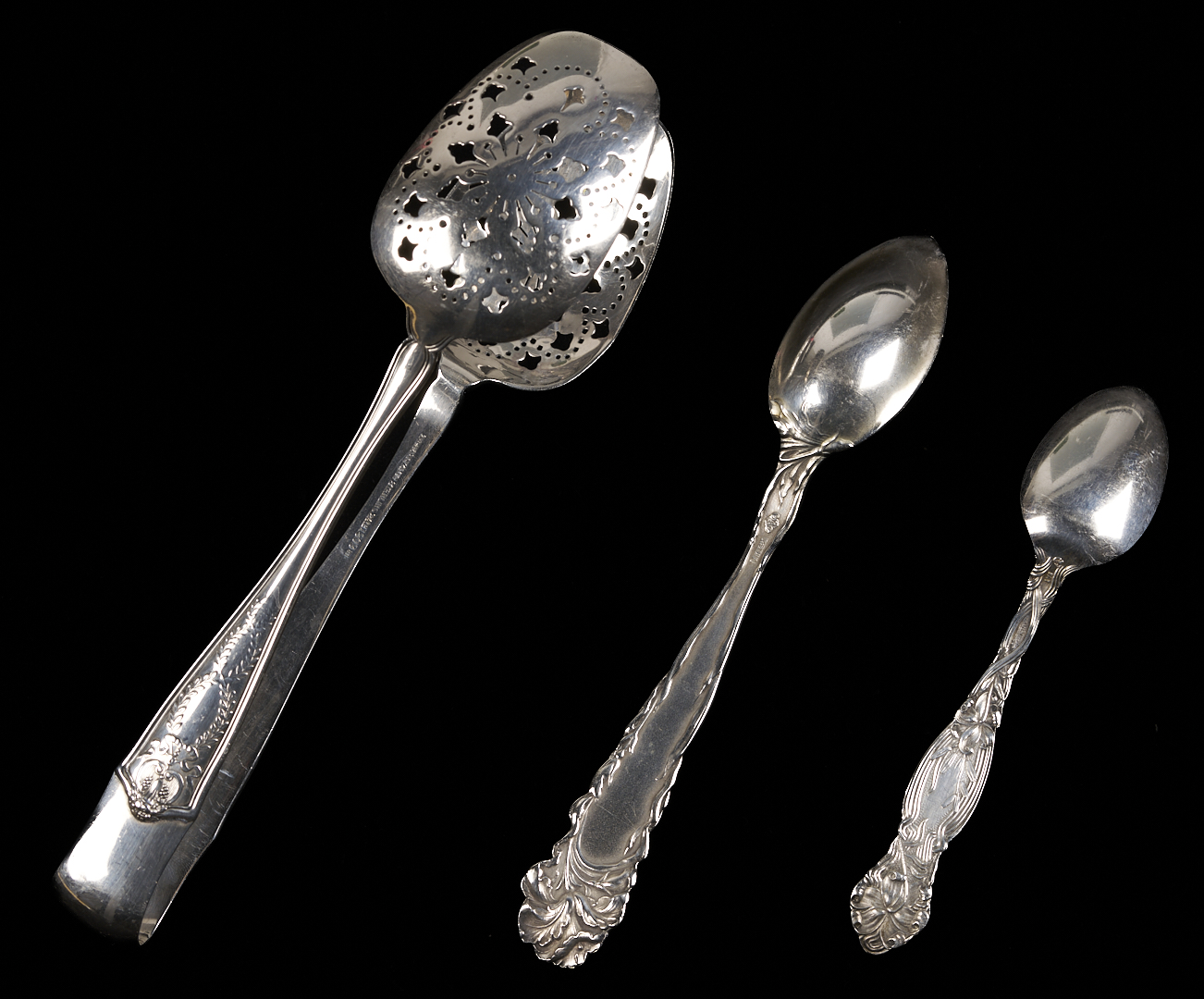 Lot 856: Tiffany Ice Tongs plus 24 Antique Silver Spoons
