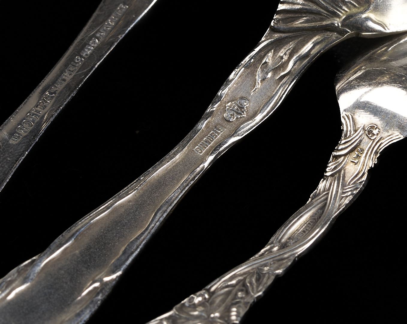 Lot 856: Tiffany Ice Tongs plus 24 Antique Silver Spoons