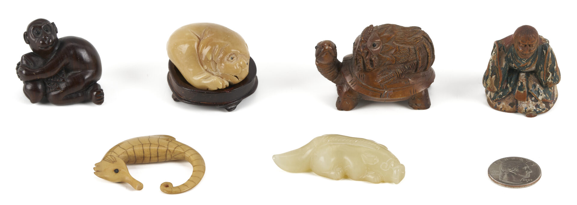 Lot 882: 11 Asian Deocrative Items. incl. Netsukes and More