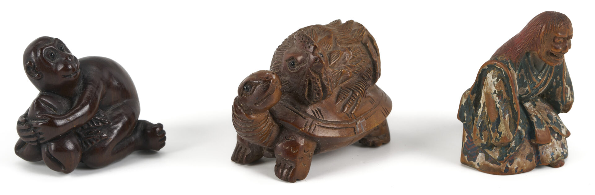 Lot 882: 11 Asian Deocrative Items. incl. Netsukes and More