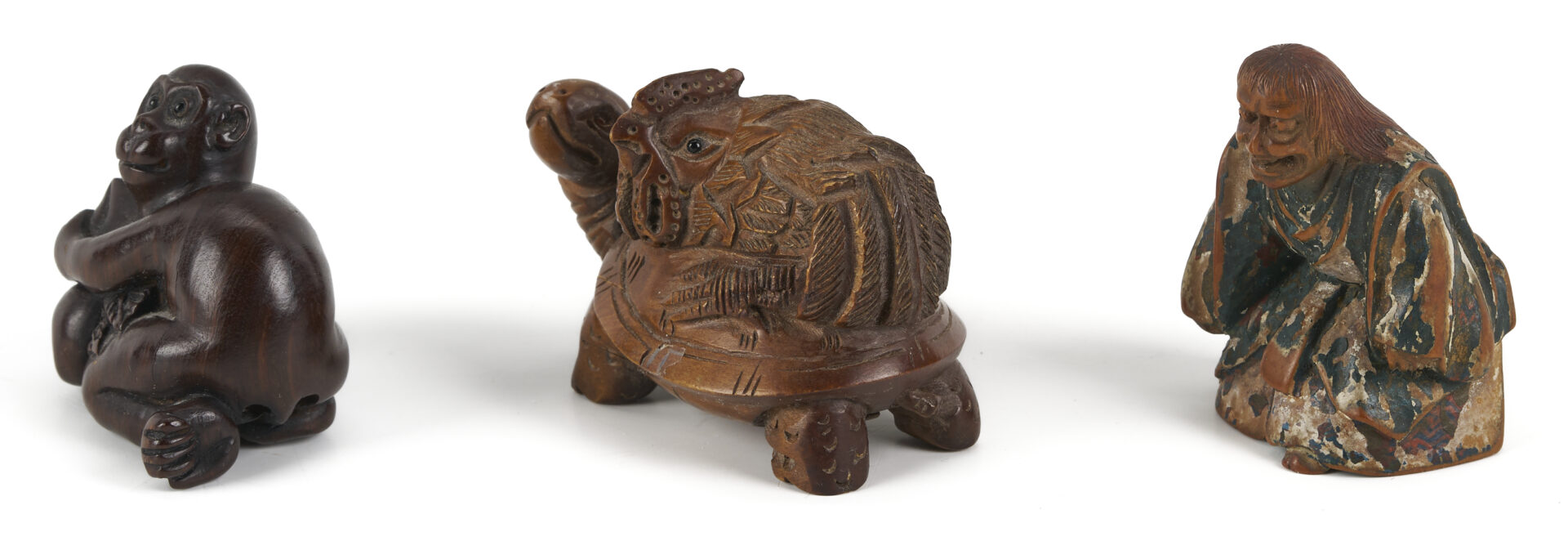 Lot 882: 11 Asian Deocrative Items. incl. Netsukes and More