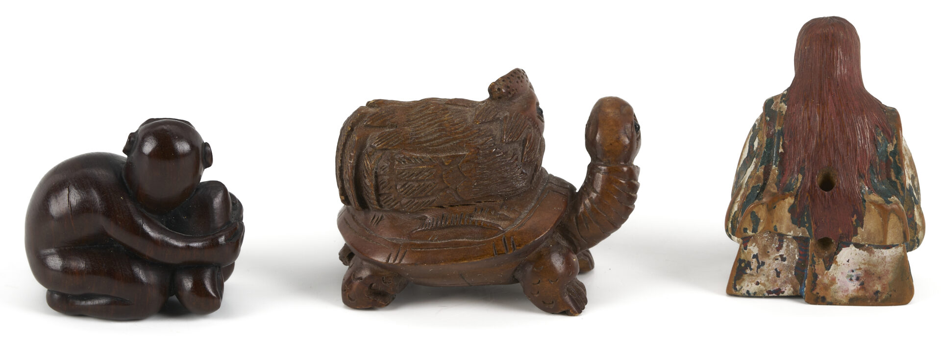 Lot 882: 11 Asian Deocrative Items. incl. Netsukes and More