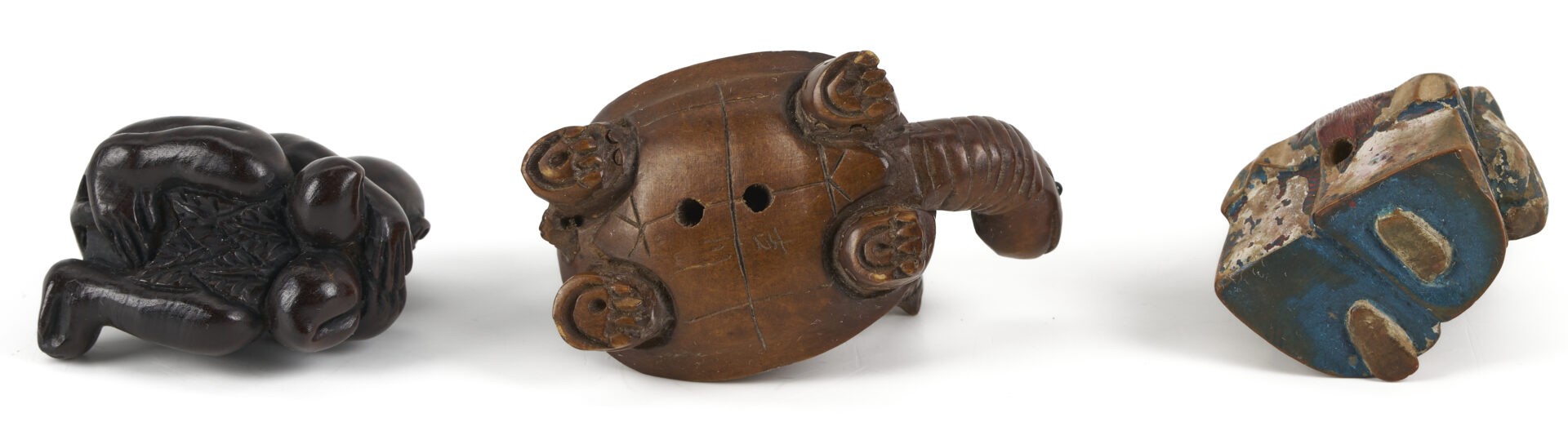 Lot 882: 11 Asian Deocrative Items. incl. Netsukes and More