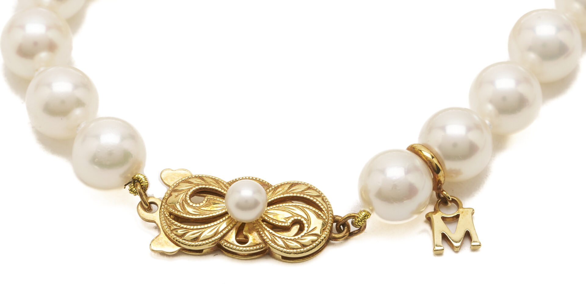 Lot 951: Ladies’ Mikimoto Pearl Necklace, 18K Gold Clasp